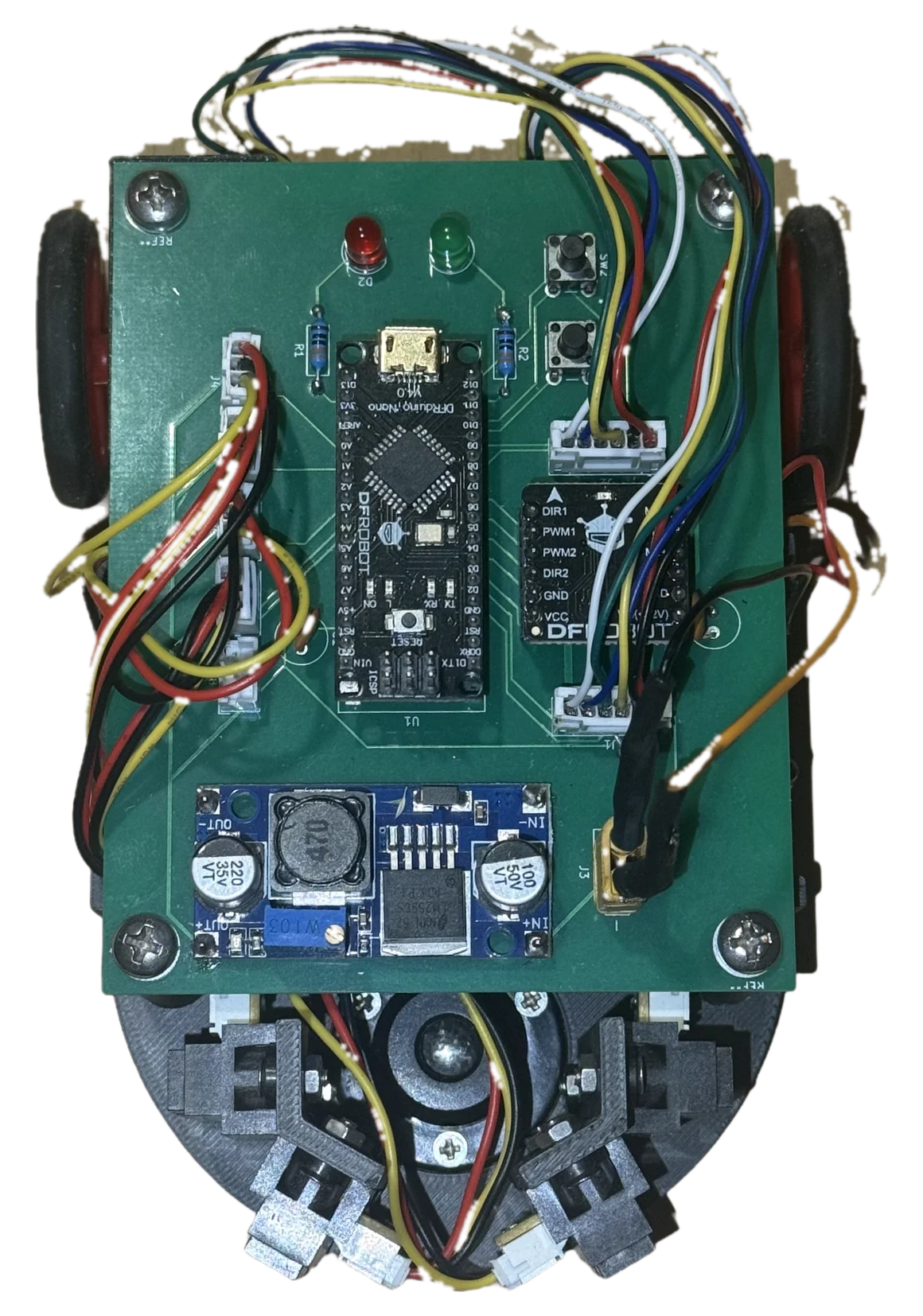 Micromouse robot seen from directly above: green circuit board, wiring looms and front sensor mounts